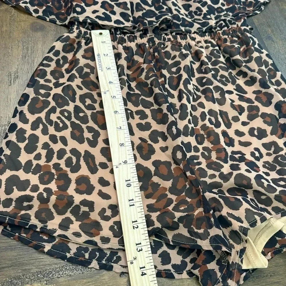 Excellent condition Show Me Your Mumu cheetah print shorts romper. Medium.